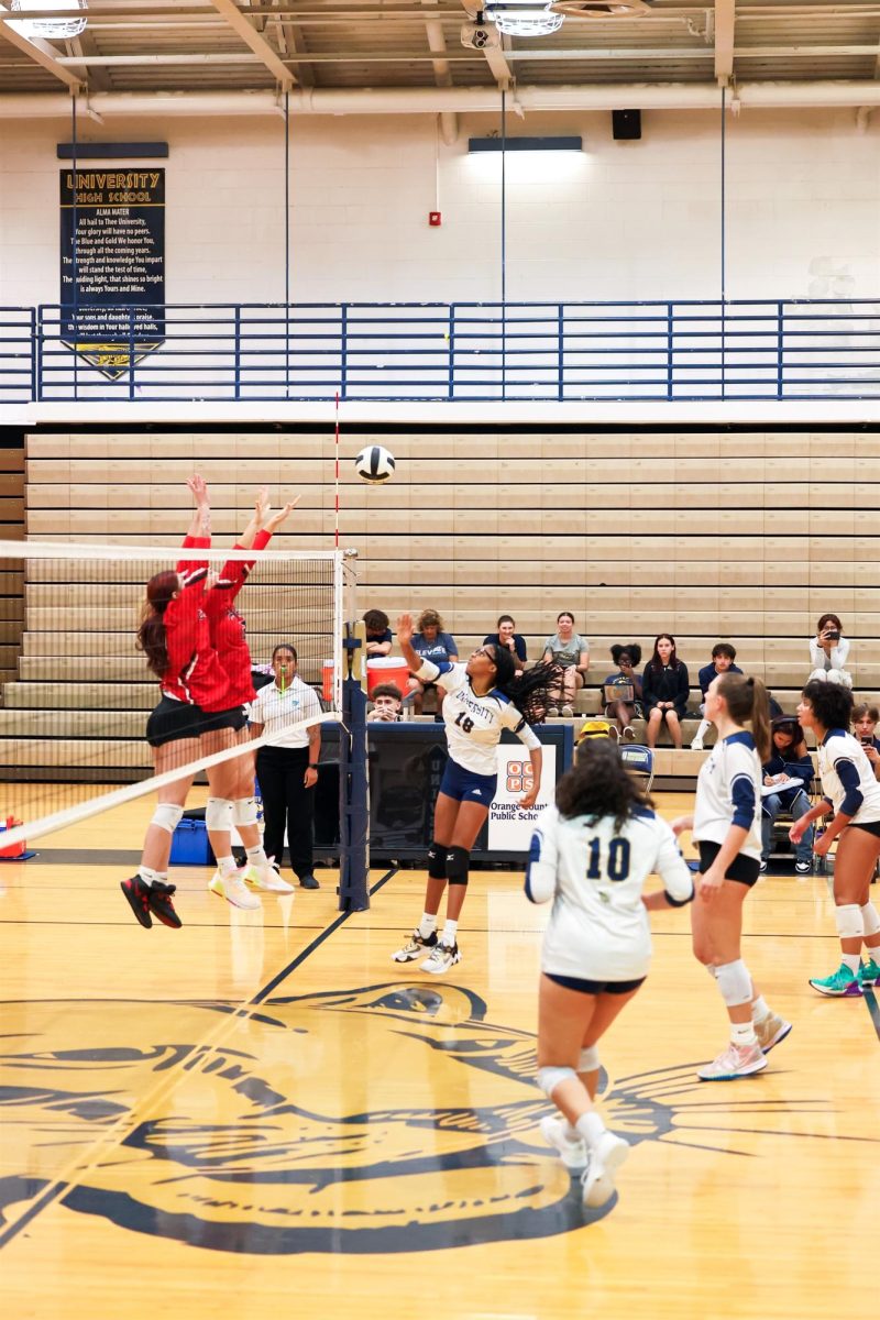 The varsity team struggled against East River in their match at University High School.