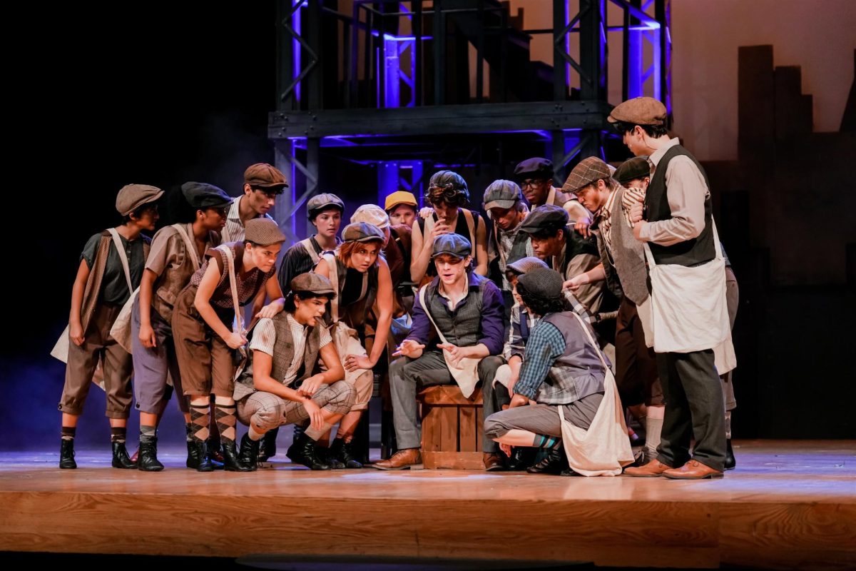 Jack, played by senior Robert Myers, shares his plan to strike with the other newsies.