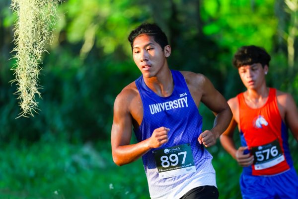 Senior Andrew Jacob OH competes during the Toho Invitational Cross Country Meet.