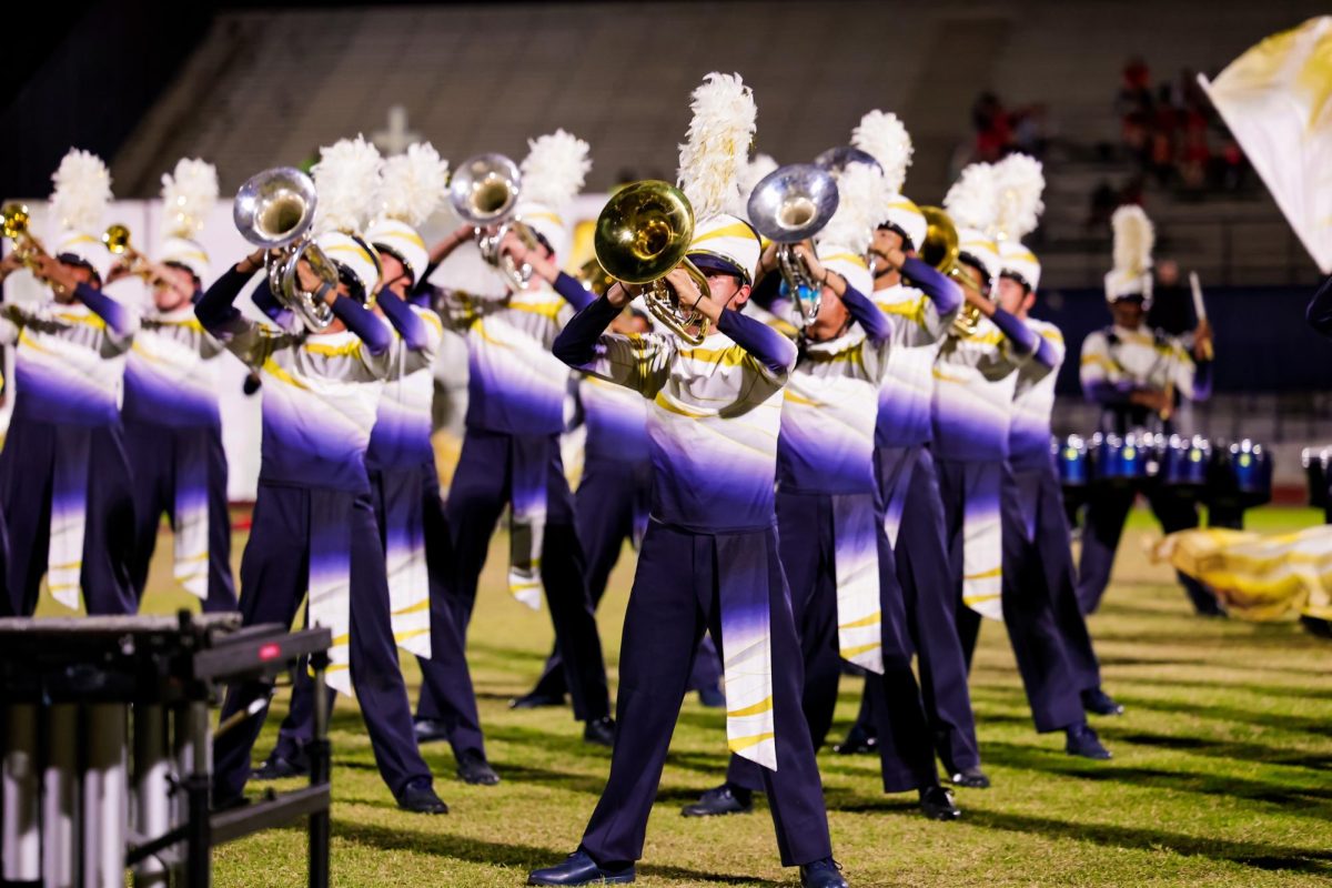 Band Members perform After at the University Classic.