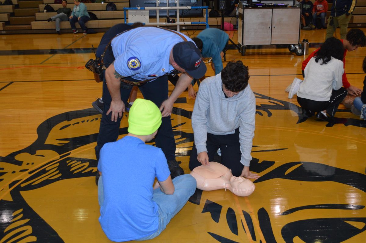 Local paramedics came to school to help teach CPR skills to students on World Heart Day. 
