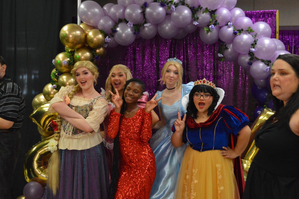 Students posed for pictures with their favorite Disney princesses.
