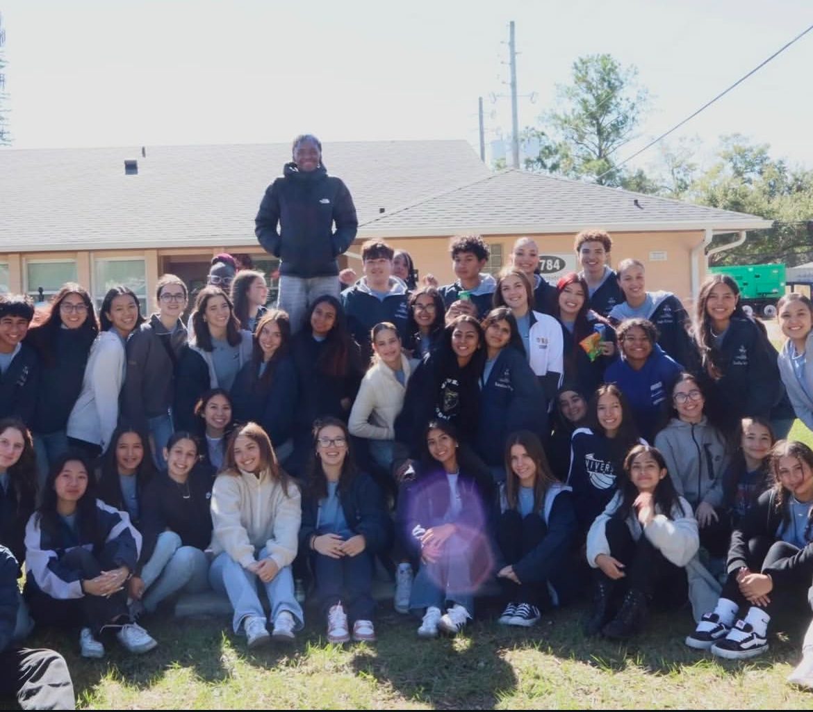 SGA students pictured after loading donation items onto a truck for transportation.