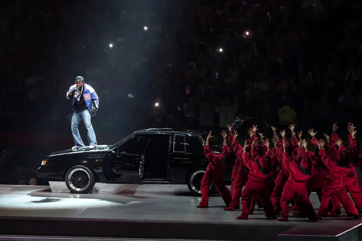 Lamar pictured performing atop the set car at the Superbowl LIX halftime show.