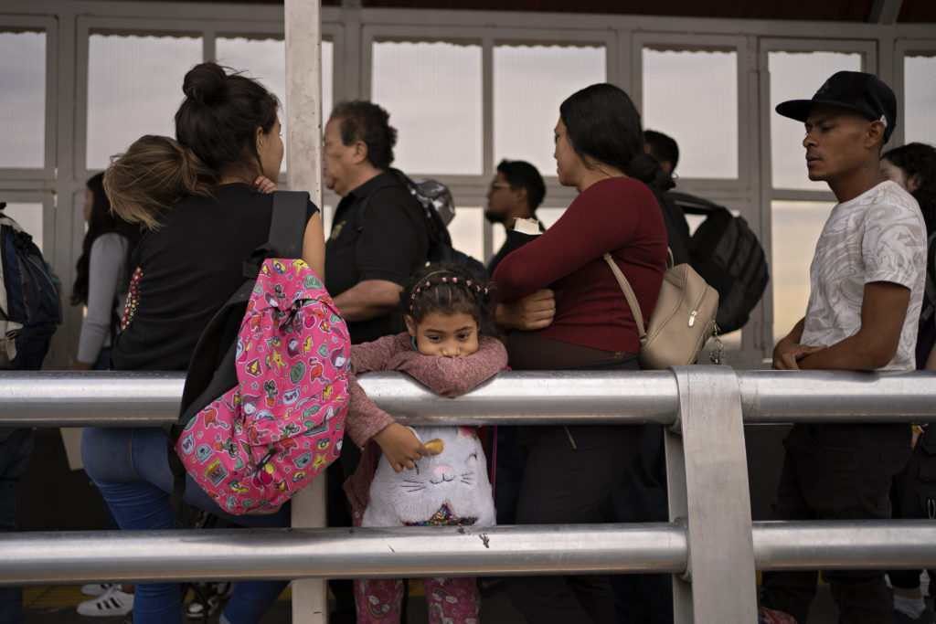 Families patiently waiting to be processed at the Customs and Border Protection facility in El Paso, Texas.

